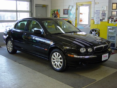 2003 Jaguar X-Type 2.5. Exterior: Ebony Interior: Sand 2003 Jaguar X-Type 2.5. Exterior: Ebony Interior: Sand